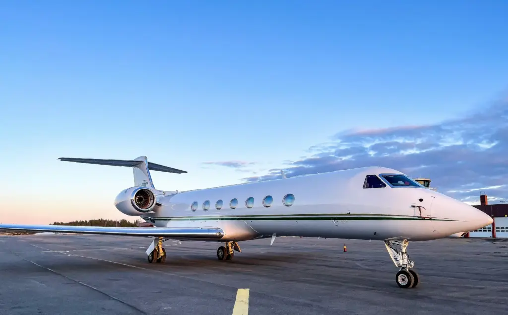 Private jet on the tarmac representing the full cost of aircraft ownership for high-net-worth individuals
